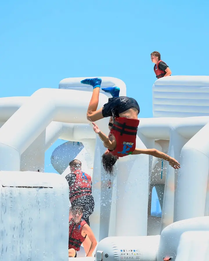 Aqua Warrior completing an airborne flip during a 100-minute session